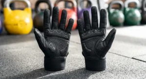 Close-up of non-slip silicone palm padding on women's full finger gym gloves for callus protection