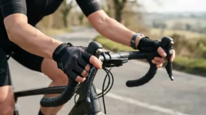 Close-up of lightweight full finger gloves for cold weather MTB gripping textured handlebar grips