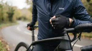 Cyclist utilizing layering with long finger road cycling gloves on a chilly early spring morning